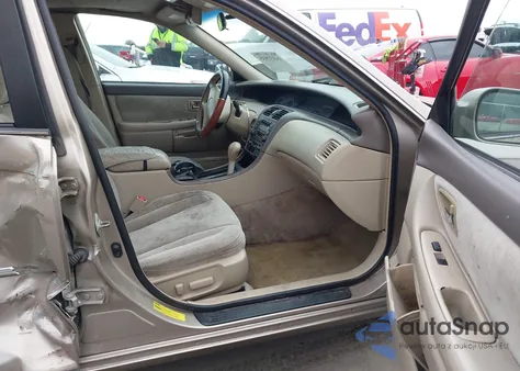 2000 Toyota Avalon Xl z USA, uszkodzony, nr VIN 4T1BF28B2YU046034